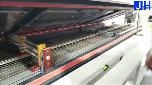 JHIMS R10 reflow oven with its top cover opened, showing the heating tunnel, mesh belt conveyor, and red safety support rod
