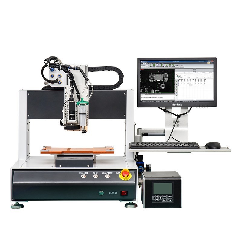 Desktop CCD jet dispensing machine with a dispensing head over a worktable and a monitor showing dispensing software